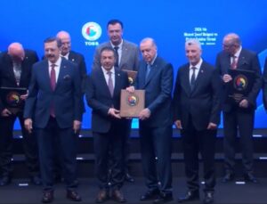 Cumhurbaşkanı Erdoğan’dan DTO Başkanı Uğur Erdoğan’a Hizmet Şeref Plaketi